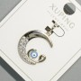 Pendant "Moon's Eye" Xuping with white crystals and blue enamel, diameter 18.5 x 19.5 mm +/-, length 26 mm +/-, rhodium-plated