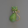 Brooch-pendant "Kitty" with green pearlescent enamel and glittering crystals, gold-tone metal 25x39mm