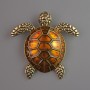 Brooch-pendant Turtle with orange enamel and golden metal 55x55mm