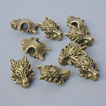 Bead insert 'Dragon', 18x13x8 mm, hole diameter 3.7 mm, pack of 9 pcs ±, bronze metal color