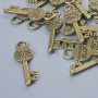 Pendant fittings 'Key', 26×8 mm diameter, 3.5 mm hole diameter, pack of 16 pcs, bronze metal color
