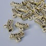 Light-gold Bail Holder, size 13.5×5 mm, hole diameter 2–2.7 mm, length 9 mm, pack of 19 pcs ± 20 g, light-gold metal color