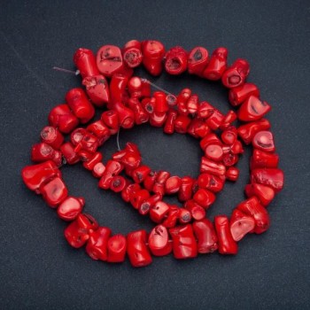 Faceted natural coral beads assortment in sizes, diameters from 12x10 to 30x12 mm, length about 38 cm, price per 100 g, on fishing line