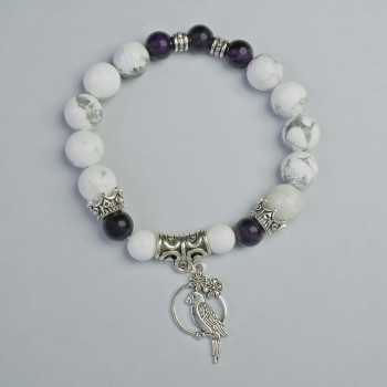 Bracelet made of Purple Cat's Eye and Howlite, diameter 10.5 mm, 8 mm +/- (stretch), length 18 cm +/- with metal inserts