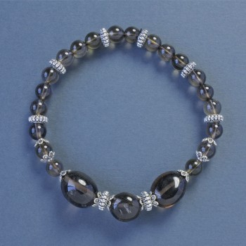 Smoky Topaz bracelet with 6 mm round beads and 10×12 mm faceted elements, length 18 cm, stretch with inserts