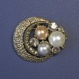 Brooch 'Accent' crescent-shaped with artificial pearls, approx. 35×40 mm, gold-tone metal