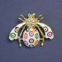 Insect Brooch with White Crystals, White, Green, and Orange Enamel on Golden Metal 39×30 mm+