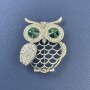Owl Brooch with green and white rhinestones, silvery metal, diameter 34 mm, length 42 mm
