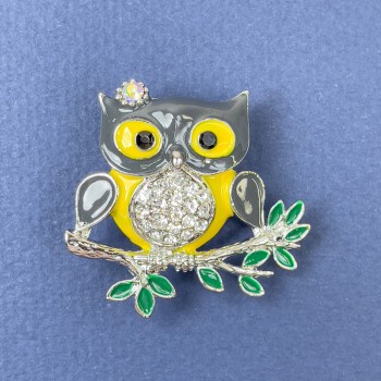 Brooch-pendant Owl with white crystals, yellow and gray enamel, silver-toned metal, diameter 33 mm, length 32 mm
