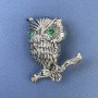 Brooch 'Owl' with green crystals, silver-toned metal, diameter approximately 28 mm, length approximately 45 mm