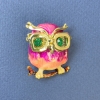 Owl brooch-pendant with green rhinestones, pink enamel, gold-tone metal, diameter 23mm, length 32mm