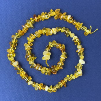 Amber chip beads 7x4 mm on a thread, length 38 cm+