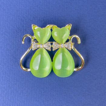 Brooch 'Cats' with green Cat's Eye white rhinestones gold-tone metal, diameter 31x38mm +