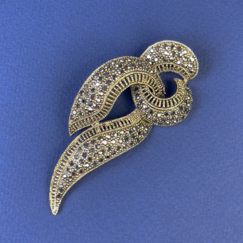 Brooch with grey rhinestones in bronze-gold metal, diameter 78x33 mm +