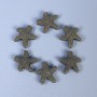 Bead Insert Sea Star bronze color, 10x3 mm, hole diameter 1.5 mm, packaging 11 pcs