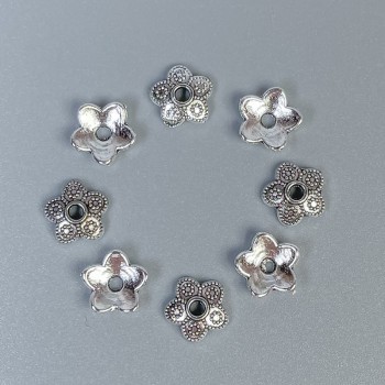 Bead cap findings in silver color, diameter 7mm with approx. 1mm hole, packaging 20 g (~90 pcs)
