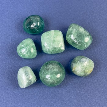 Fluorite tumbled stone — natural souvenir, sizes 16–20 mm (+/-) — weight 10–15 g (+/-) per piece (price per 100 g)
