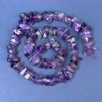 Amethyst chip beads on thread, diameter 7-10×3-7 mm, length about 40 cm