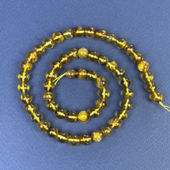 Amber beads smooth ball 8 mm on thread, length 39 cm
