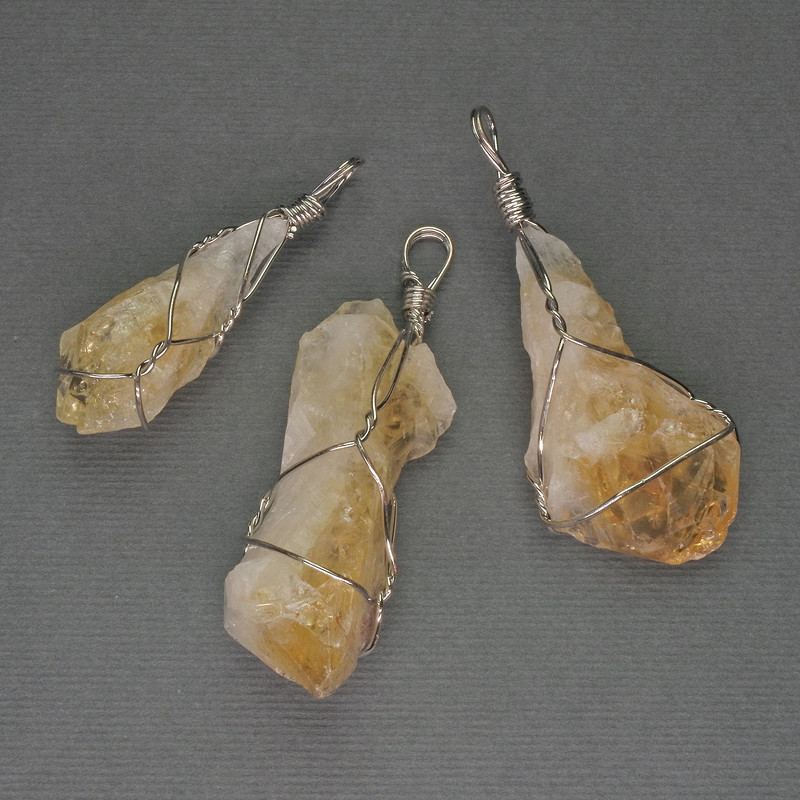 Unpolished Citrine Pendant in Weave 60x40x18 mm ± Assorted Sizes