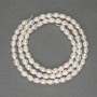 Freshwater white pearls on a thread, diameter 4–4.5×4 mm, length 37 cm