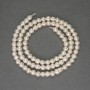Freshwater white pearls on a thread, diameter 4×3.5 mm, length 36 cm