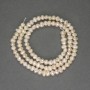 Freshwater white oval pearls on a thread, diameter 3x4 mm ± on thread, length 34 cm ±
