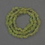 Chrysolite Beads, Unpolished Stone, Drop-Shaped, 6-9×5 mm, on a Thread, Length 38 cm+