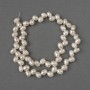 Oval natural freshwater pearl beads 8x6 mm, 38 cm long on a thread