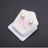 Peach-colored freshwater pearl stud earrings with silver clasp, 7-8 mm diameter