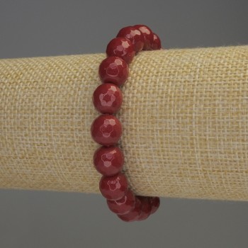 Faceted coral bead bracelet, approximately 10 mm diameter, 18 cm stretch
