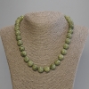 Snake chain necklace with polished 12mm beads, length approximately 50 cm, with clasp