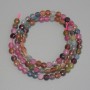 Tourmaline beads, faceted coin shape, 4-5 mm diameter, 38 cm length on thread