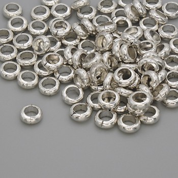 Bead-insert Clover, silver-colored metal, 6×2 mm with hole about 3.8 mm, packaging 20 g (~92 pcs)