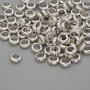 Bead-insert Clover, silver-colored metal, 6×2 mm with hole about 3.8 mm, packaging 20 g (~92 pcs)