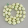 Chrysolite Olivine Faceted Beads, 10x8 mm, 3 mm seed beads, on a thread, about 39 cm long