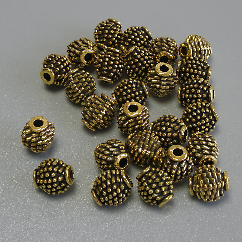 Gold-tone bead insert findings, diameter 7×6 mm +- hole diameter 1.9 mm +- packaging 20 g (~31 pcs)