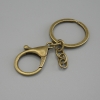 Price per pack /10 pcs. Base for keychain with two attachments: carabiner 33×24 mm and ring, diameter 3 cm, length 7 cm