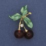 Brooch 'Cherries' with green enamel and white crystals in golden metal, 39x28mm+
