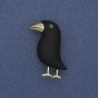 Bird Brooch with black matte finish, green rhinestone, golden metal, 36x21 mm+