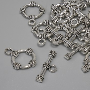 Toggle clasp hardware, diameter 19.5×3.5 mm; circle diameter approx. 14 mm; hole diameter 9 mm; silver-colored metal; fatovka 11 pcs