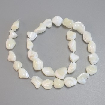 Mother-of-pearl faceted beads, diameter 12-15×10-11 mm, 5 mm +/-; length 38 cm +/- on beading thread