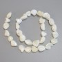 Mother-of-pearl faceted beads, diameter 12-15×10-11 mm, 5 mm +/-; length 38 cm +/- on beading thread