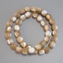 Beige mother-of-pearl barrel beads, diameter 10×9, 5 mm +/-; length 40 cm +/- on thread