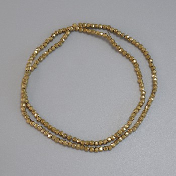 Gold-colored hematite beads, 2x2mm, faceted, on thread, length 38 cm+