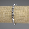 Silver-colored hematite bracelet with faceted 6 mm beads, length 18 cm, stretch