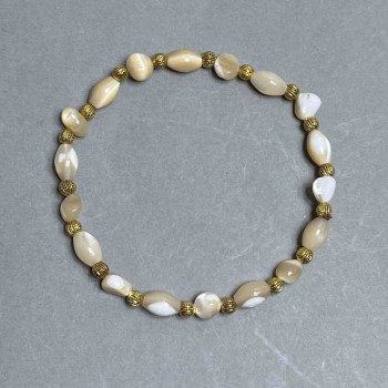 Beige Mother-of-Pearl Bracelet, faceted 7x7-8 mm beads, 9x5, 5 mm, length 18 cm, stretch