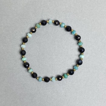 Bracelet with a faceted agate bead 6mm ±, a faceted apatite rondel 5x3.5mm ±, length 18 cm stretch