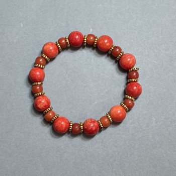 Bracelet Coral (artificial) with 10mm beads and 7x5mm rondelles, with metal inserts, 18 cm stretch