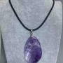 Amethyst Pendant, 40×55 mm (+/-), on a rubber cord, 60 cm long with a 5 cm extender chain